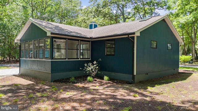 5 Kent Ave, Ocean View, DE 19970 - view of front of property with crawl space, a shingled roof, and a sunroom