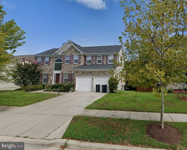 view of front of house with stone siding, concrete driveway, a garage, and a front lawn