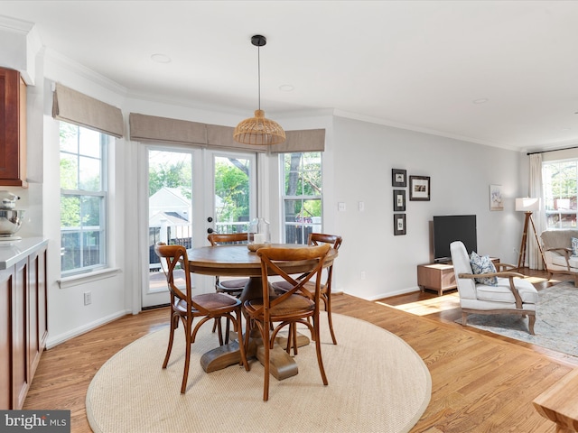 35513 Sourwood Pl, Round Hill, VA 20141 - dining area with light wood-style flooring, ornamental molding, and baseboards