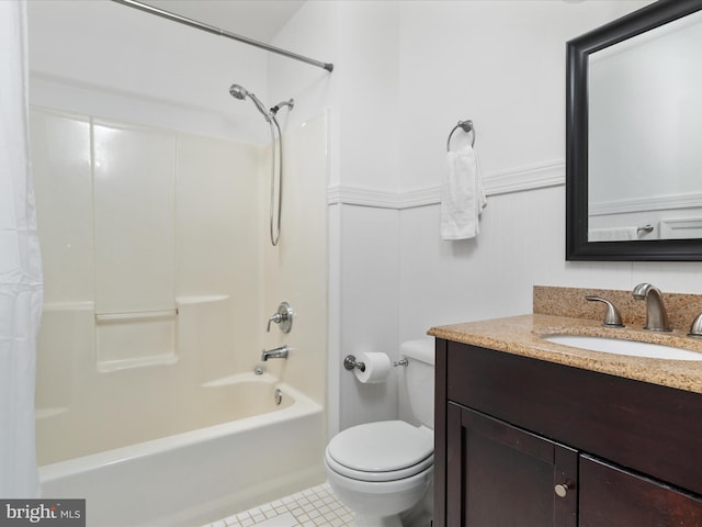 35513 Sourwood Pl, Round Hill, VA 20141 - full bathroom featuring toilet, vanity, tile patterned floors, shower / bath combo with shower curtain, and wainscoting