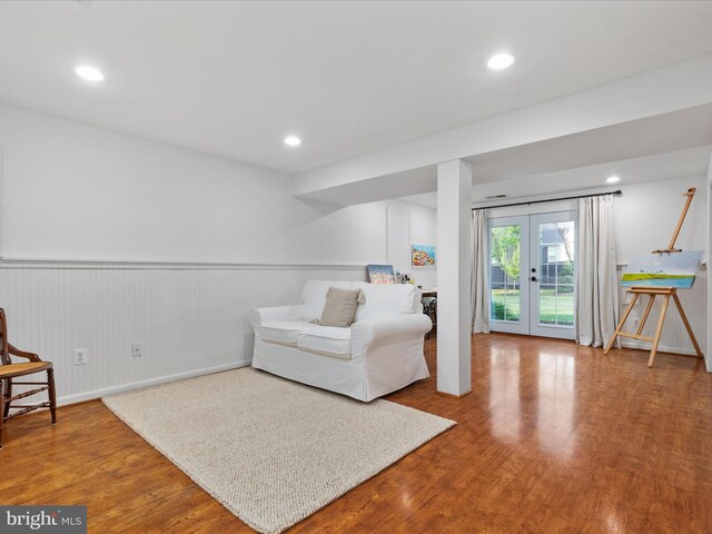 35513 Sourwood Pl, Round Hill, VA 20141 - living area with french doors, a wainscoted wall, wood finished floors, recessed lighting, and baseboards