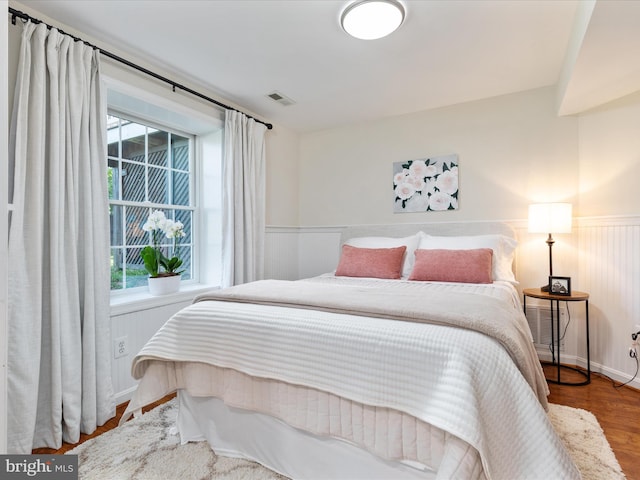 35513 Sourwood Pl, Round Hill, VA 20141 - bedroom featuring wainscoting and wood finished floors