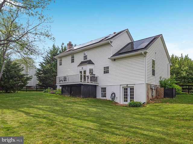 35513 Sourwood Pl, Round Hill, VA 20141 - rear view of property featuring a chimney, french doors, solar panels, and a deck