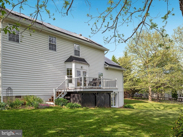 35513 Sourwood Pl, Round Hill, VA 20141 - rear view of house featuring a lawn, a wooden deck, solar panels, stairs, and crawl space
