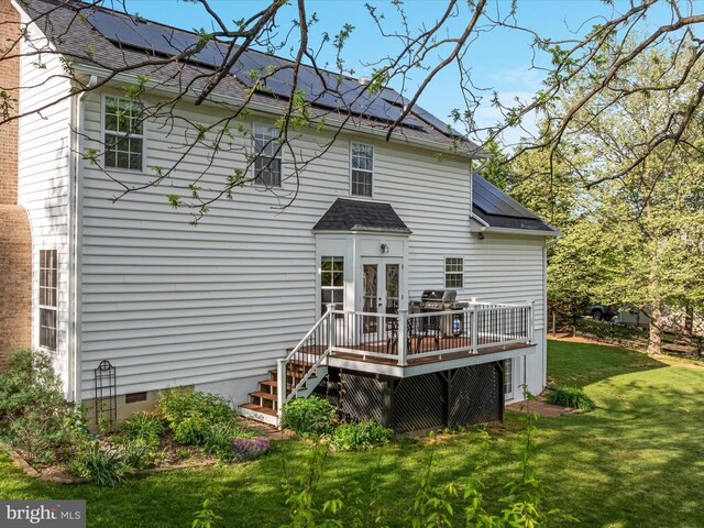 35513 Sourwood Pl, Round Hill, VA 20141 - back of property featuring french doors, a lawn, a deck, solar panels, and crawl space