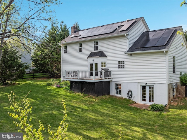 35513 Sourwood Pl, Round Hill, VA 20141 - rear view of property featuring french doors, a deck, roof with shingles, a chimney, and roof mounted solar panels