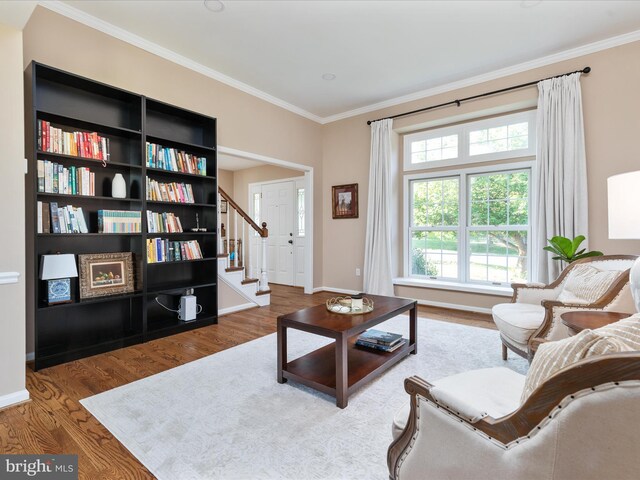 35513 Sourwood Pl, Round Hill, VA 20141 - living area with wood finished floors, crown molding, stairway, and baseboards