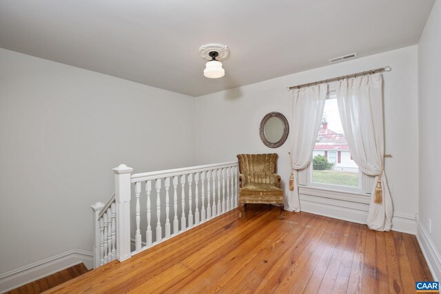 2010 White Bridge Rd, Waynesboro, VA 22980 - sitting room featuring an upstairs landing, hardwood / wood-style flooring, and baseboards