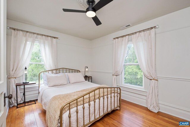 2010 White Bridge Rd, Waynesboro, VA 22980 - bedroom featuring light wood-style floors, baseboards, and a ceiling fan