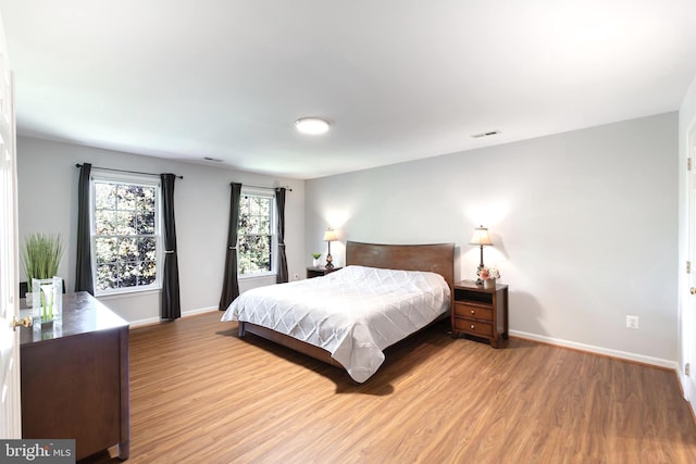 12685 Fox Woods Dr, Herndon, VA 20171 - bedroom with wood finished floors and baseboards