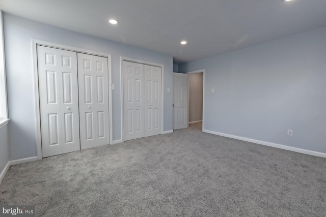 550 N 58th St, Philadelphia, PA 19131 - unfurnished bedroom with multiple closets, carpet, recessed lighting, and baseboards