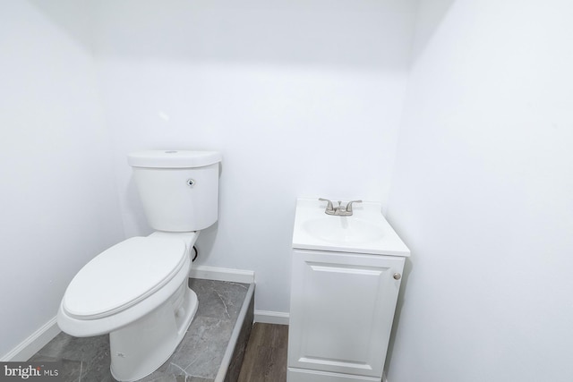 550 N 58th St, Philadelphia, PA 19131 - half bathroom featuring toilet, vanity, and baseboards