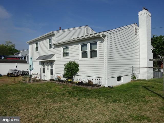 218 Hendrickson Ave, Beverly, NJ 08010 - rear view of property featuring a chimney and central AC