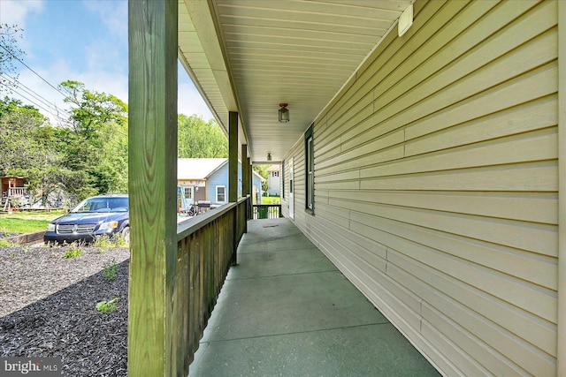 view of home's exterior featuring a porch