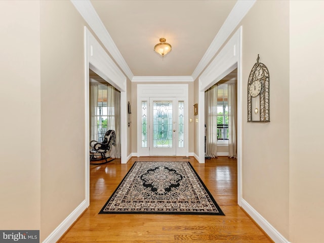 16013 Pheasant Ridge Ct, Woodbine, MD 21797 - foyer with wood finished floors, plenty of natural light, ornamental molding, and baseboards