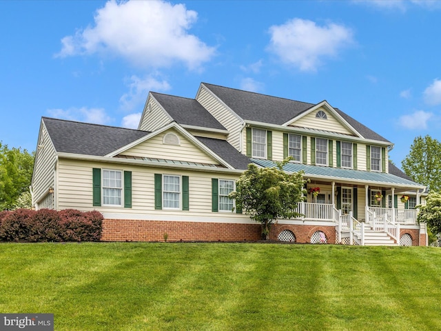 16013 Pheasant Ridge Ct, Woodbine, MD 21797 - view of front of house with a porch, a shingled roof, a front lawn, a standing seam roof, and metal roof
