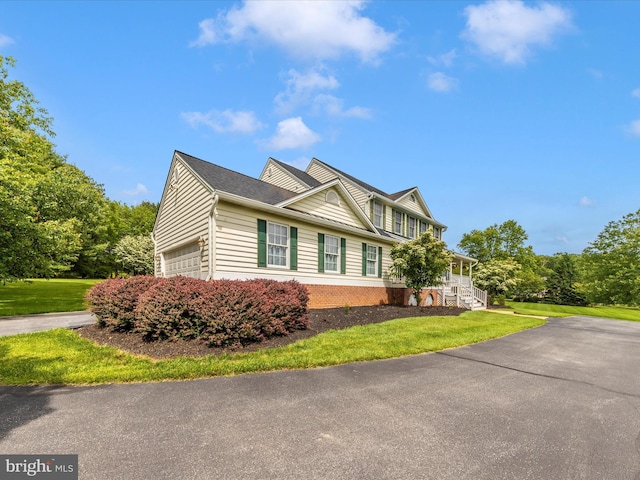 16013 Pheasant Ridge Ct, Woodbine, MD 21797 - view of home's exterior featuring a yard, a garage, and a porch