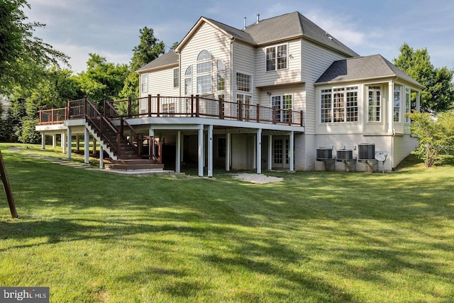 17301 Roundmont Pl, Round Hill, VA 20141 - back of house with a wooden deck, stairway, a yard, and central AC