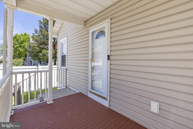 wooden terrace featuring a porch