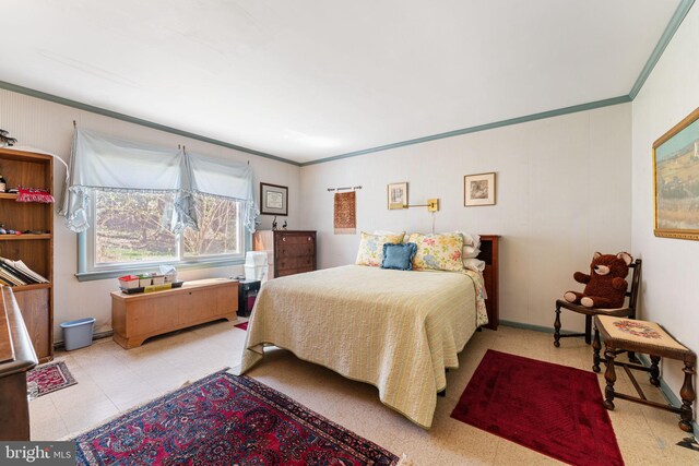 bedroom with crown molding
