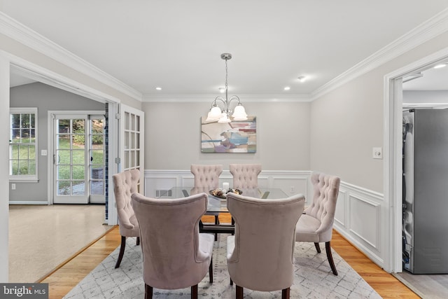 13429 Locksley Ln, Silver Spring, MD 20904 - dining room with a chandelier, light wood-type flooring, crown molding, recessed lighting, and a wainscoted wall