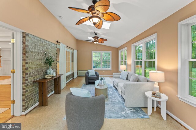 13429 Locksley Ln, Silver Spring, MD 20904 - living area with a ceiling fan, vaulted ceiling, and baseboards
