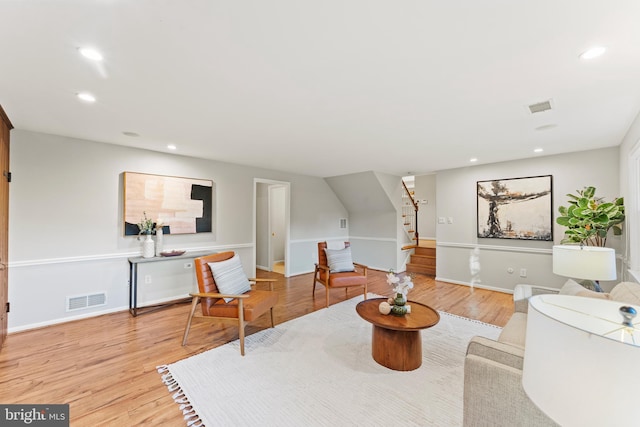 13429 Locksley Ln, Silver Spring, MD 20904 - living room featuring stairs, light wood-style flooring, recessed lighting, and baseboards