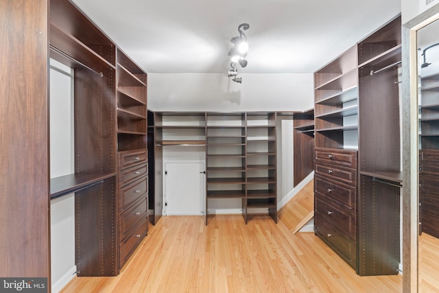 13429 Locksley Ln, Silver Spring, MD 20904 - walk in closet with light wood-style floors