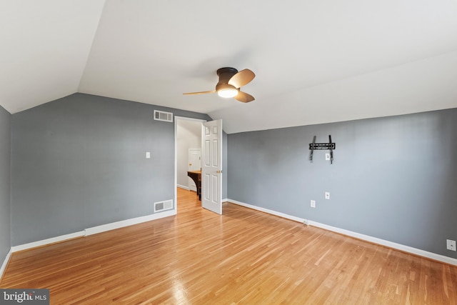 13429 Locksley Ln, Silver Spring, MD 20904 - empty room featuring a ceiling fan, vaulted ceiling, baseboards, and light wood-style flooring
