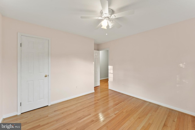 13429 Locksley Ln, Silver Spring, MD 20904 - unfurnished room featuring light wood finished floors, a ceiling fan, and baseboards