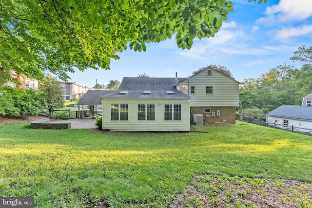 13429 Locksley Ln, Silver Spring, MD 20904 - rear view of house with central air condition unit and a patio area