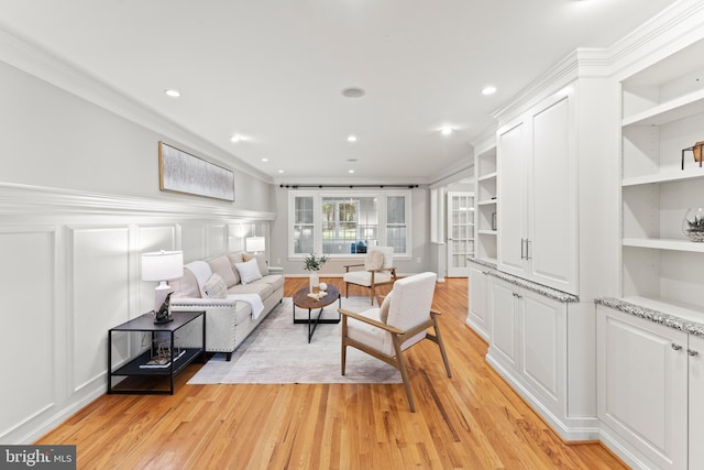 13429 Locksley Ln, Silver Spring, MD 20904 - living room with light wood-style floors, a decorative wall, ornamental molding, a wainscoted wall, and recessed lighting