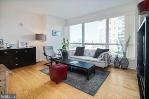 901 N Penn St Unit P507, Philadelphia, PA 19123 - living area featuring wood finished floors
