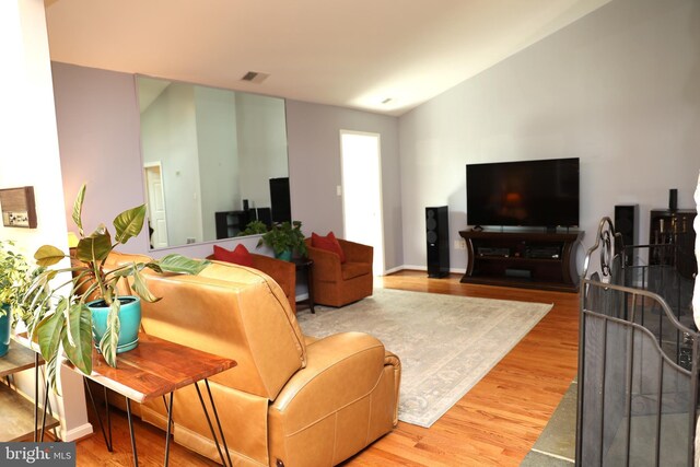 2616 Osage St, Hyattsville, MD 20783 - living area featuring wood finished floors and lofted ceiling