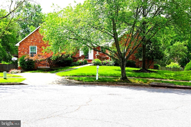 2616 Osage St, Hyattsville, MD 20783 - view of property hidden behind natural elements with brick siding