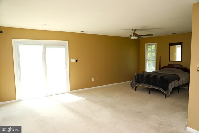 2616 Osage St, Hyattsville, MD 20783 - bedroom with baseboards, light carpet, and ceiling fan