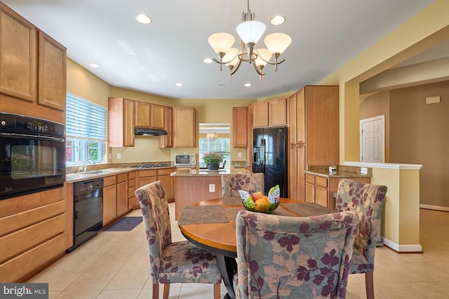 7419 Near Thicket Way, Laurel, MD 20707 - kitchen with black appliances, a chandelier, under cabinet range hood, light tile patterned flooring, and recessed lighting