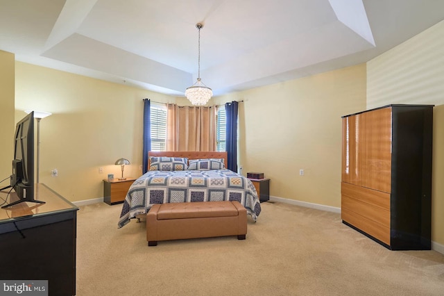 7419 Near Thicket Way, Laurel, MD 20707 - bedroom featuring a tray ceiling, light carpet, and baseboards