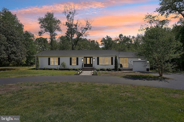 302 Fenwick Rd, Pilesgrove, NJ 08098 - view of front of house with driveway, an attached garage, a front lawn, and view of wooded area