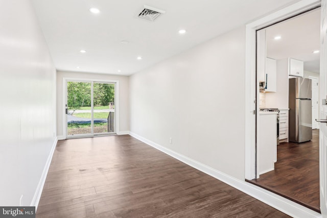 302 Fenwick Rd, Pilesgrove, NJ 08098 - unfurnished room featuring dark wood-type flooring, baseboards, and recessed lighting