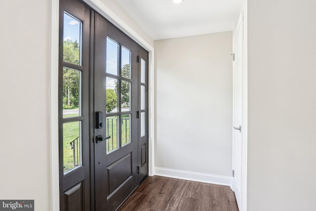 302 Fenwick Rd, Pilesgrove, NJ 08098 - entryway with dark wood-style floors and baseboards
