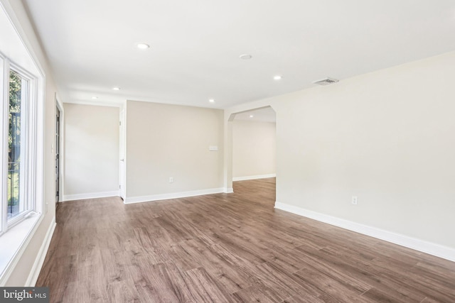 302 Fenwick Rd, Pilesgrove, NJ 08098 - spare room featuring wood finished floors, recessed lighting, arched walkways, and baseboards