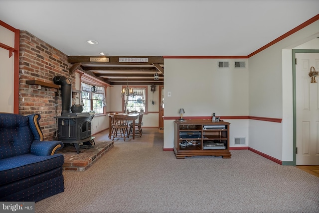 256 Crystal Ter, Haddonfield, NJ 08033 - carpeted living room featuring a wood stove and baseboards