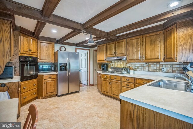 256 Crystal Ter, Haddonfield, NJ 08033 - kitchen with black appliances, a sink, coffered ceiling, tasteful backsplash, and under cabinet range hood