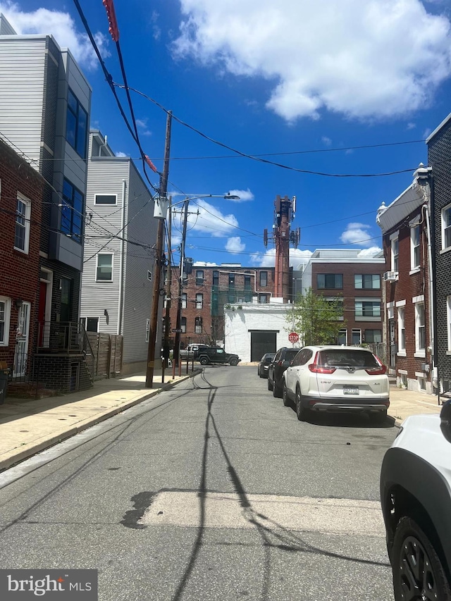 2136 E Tucker St, Philadelphia, PA 19125 - view of asphalt road featuring curbs, sidewalks, and street lighting