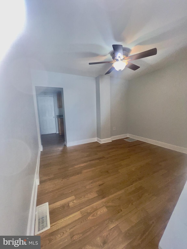 2136 E Tucker St, Philadelphia, PA 19125 - empty room with ceiling fan, baseboards, and dark wood-style flooring