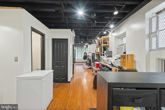 17 W Chase St, Baltimore, MD 21201 - kitchen with white refrigerator and wood finished floors