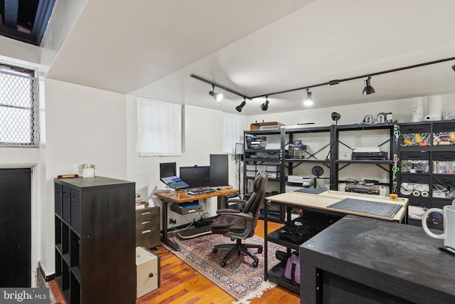 17 W Chase St, Baltimore, MD 21201 - home office featuring wood finished floors and rail lighting