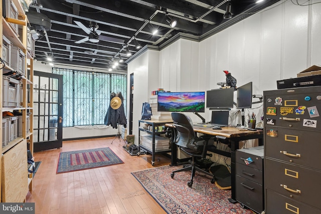 17 W Chase St, Baltimore, MD 21201 - office featuring hardwood / wood-style flooring, ceiling fan, and a decorative wall