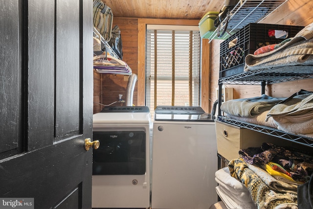 17 W Chase St, Baltimore, MD 21201 - washroom featuring washer and clothes dryer, wooden ceiling, and wooden walls